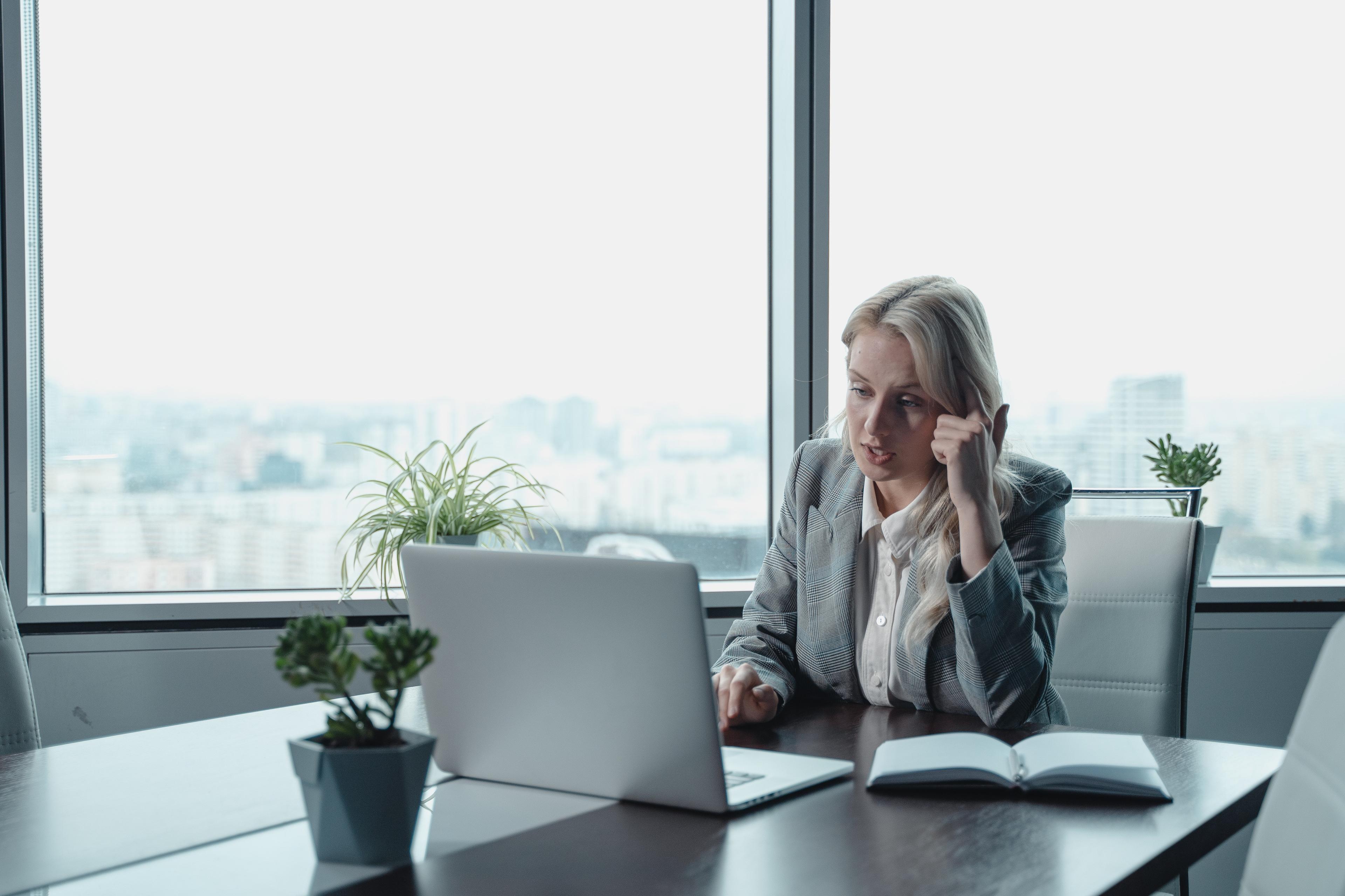 woman using laptop at work